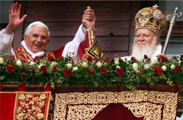 Pope Benedict XVI and Patriarch Bartholomew I of Constantinople greet the faithful as they stand on the balcony of the Ecumenical Patriarchate in Istanbul in 2006