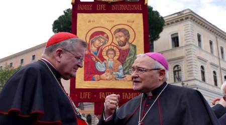 Archbishop Luigi Negri, speaks with Cardinal Raymond Burke at Rome's March for Life in May 2016.