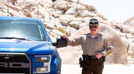 Sheriff Leon Wilmot in the desert by the U.S.Mexico border near Yuma, Ariz., on May 25, 2018