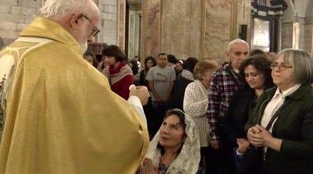 Bishop Celestino As denies Communion to kneeling woman, April 18, 2019.