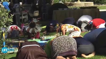 People bow to Pachamama during pagan rite in Vatican Gardens prior to opening of Amazon Synod, Oct. 4, 2019.