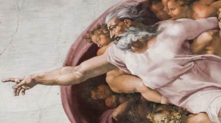 Detail of God in Michelangelo's Creation of Man inside the Sistine Chapel in Vatican City.