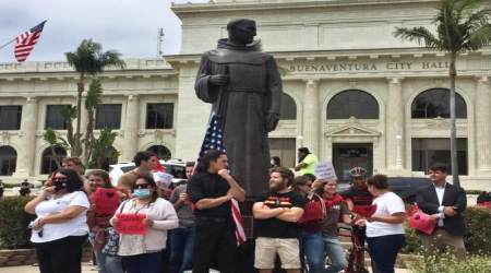 Catholic youths protect statue of Saint Serra, June 20, 2020, Ventura, California.