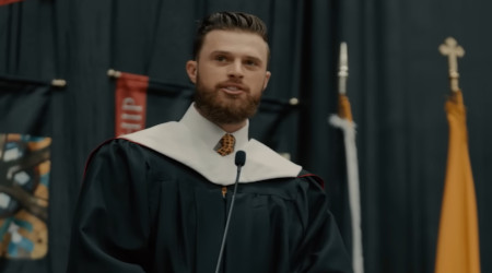 Kansas City Chiefs kicker Harrison Butker delivers the commencement address at Benedictine College in Kansas.